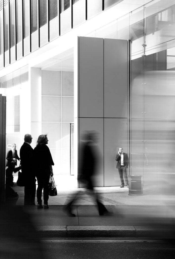 Lancaster & David, CPAs - black and white image of people walking downtown.