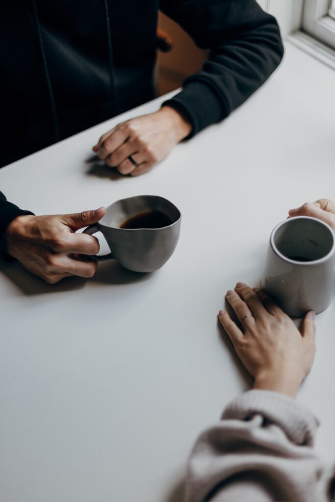 Lancaster & David, CPAs - two people having coffee together.